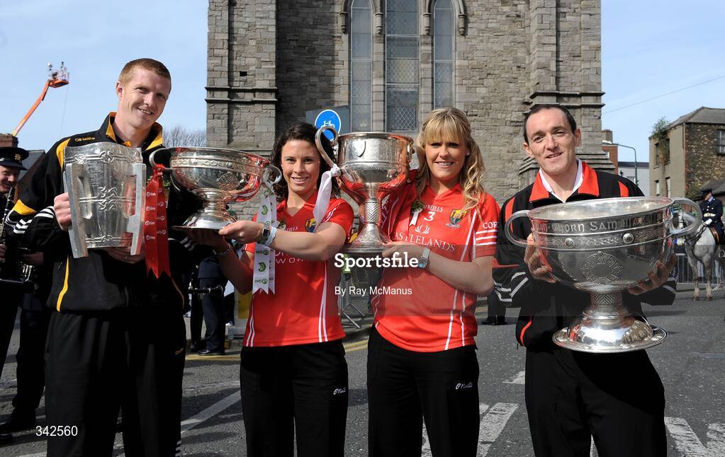 17 March 2009; The four All-Ireland Senior Championship winning captains, from left to right, Henry Shefflin, Kilkenny, with the Liam MacCarthy Cup, Caitriona Foley, Cork, with the O'Duffy Cup, Angela Walsh, Cork, with the Brendan Martin Cup, and Brian Dooher, Tyrone, with the Sam Maguire Cup as part of the 'Monumental Moments’ from the St. Patrick’s Day Parade, part of the GAA's 125th Anniversary. AIB All-Ireland Senior Club Football Championship Final, St Mary's Place, Dublin. Picture credit: Ray McManus / SPORTSFILE