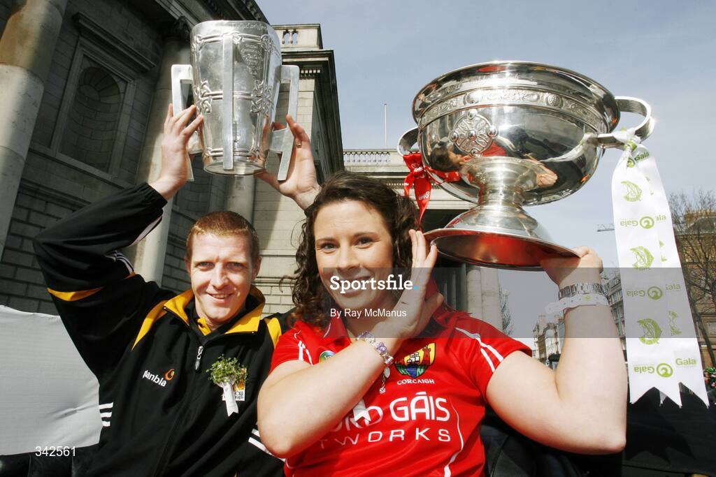 17 March 2009; Two of the four All-Ireland Senior Championship winning captains Henry Shefflin, Kilkenny, with the Liam MacCarthy Cup, and Caitriona Foley, Cork, with the O'Duffy Cup, as part of the 'Monumental MomentsÍ from the St. PatrickÍs Day Parade, part of the GAA's 125th Anniversary. AIB All-Ireland Senior Club Football Championship Final, St Mary's Place, Dublin. Picture credit: Ray McManus / SPORTSFILE