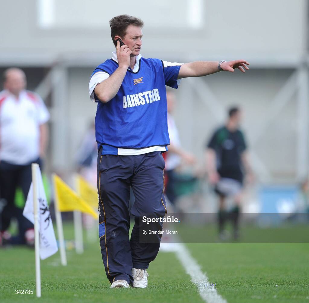17 March 2009; Portumna manager Johnny Kelly speaks on a mobile phone during the game. AIB All-Ireland Senior Club Hurling Championship Final, Portumna, Co. Galway v De La Salle, Waterford, Croke Park, Dublin. Picture credit: Brendan Moran / SPORTSFILE