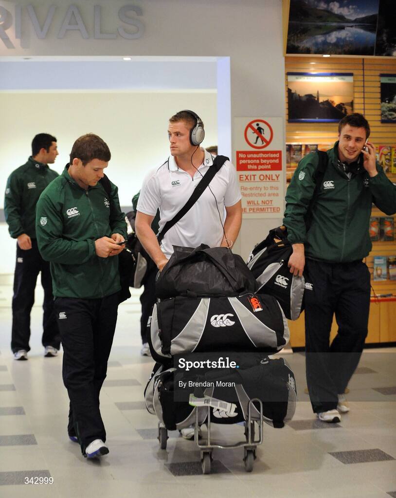 19 March 2009; Ireland players, from left, Gordon D'Arcy, Jamie Heaslip and Tommy Bowe on the team's arrival at Cardiff Airport ahead of their RBS Six Nations Championship match against Wales on Saturday. Cardiff Airport, Wales. Picture credit: Brendan Moran / SPORTSFILE