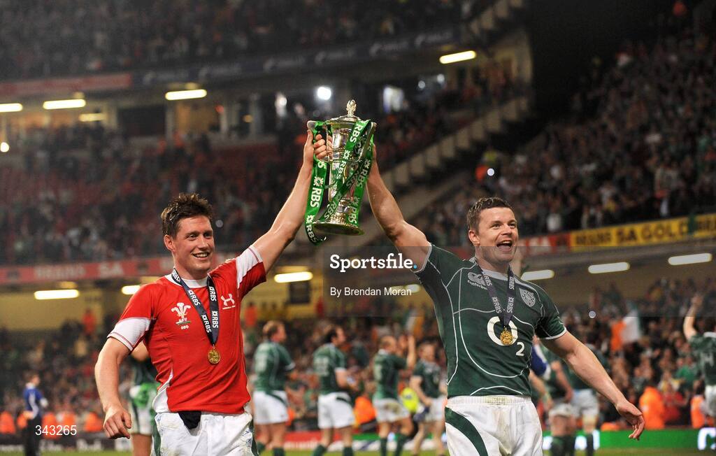 21 March 2009; Ireland captain Brian O'Driscoll, right, celebrates with team-mate Ronan O'Gara and the RBS Six Nations trophy. RBS Six Nations Championship, Wales v Ireland, Millennium Stadium, Cardiff, Wales. Picture credit: Brendan Moran / SPORTSFILE