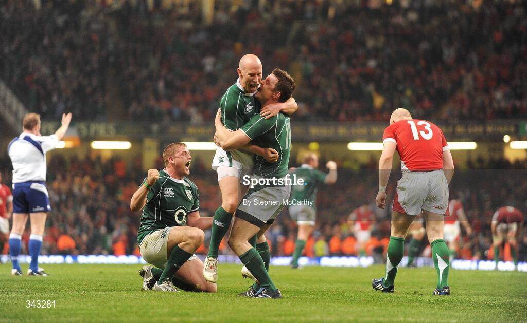 21 March 2009; Ireland players, from left, Jamie Heaslip, Peter Stringer and Brian O'Driscoll celebrate at the final whistle. RBS Six Nations Championship, Wales v Ireland, Millennium Stadium, Cardiff, Wales. Picture credit: Stephen McCarthy / SPORTSFILE