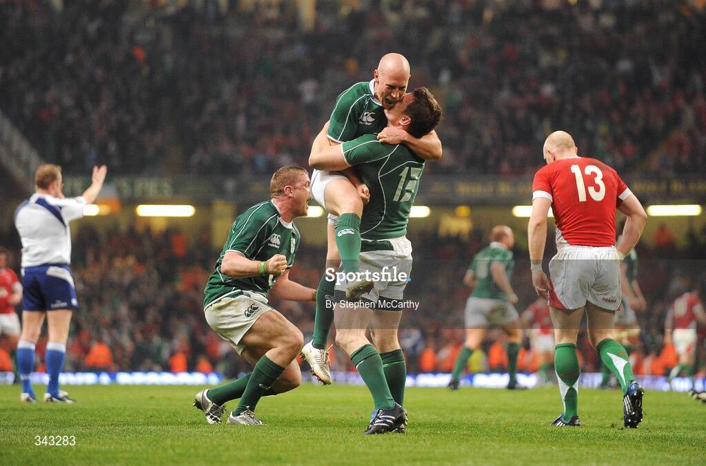 21 March 2009; Ireland players, from left, Jamie Heaslip, Peter Stringer and Brian O'Driscoll celebrate at the final whistle. RBS Six Nations Championship, Wales v Ireland, Millennium Stadium, Cardiff, Wales. Picture credit: Stephen McCarthy / SPORTSFILE