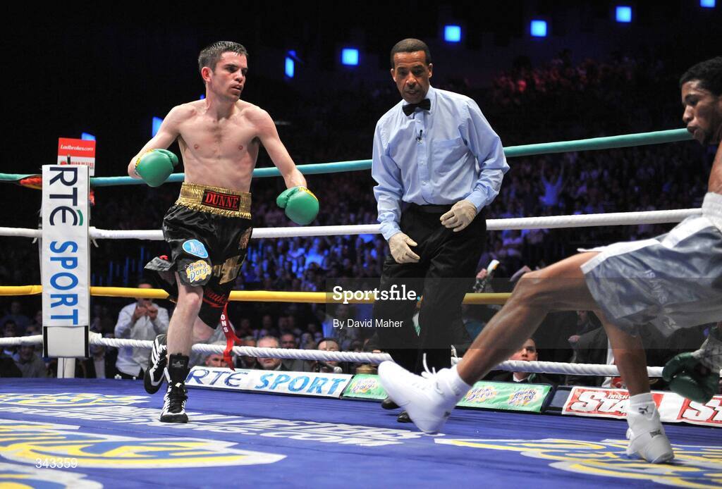 21 March 2009; Bernard Dunne puts Ricardo Cordoba down during the third round of their WBA World Super Bantamweight title fight. Hunky Dory World Title Fight Night, Bernard Dunne v Ricardo Cordoba, The O2, Dublin. Picture credit: David Maher / SPORTSFILE