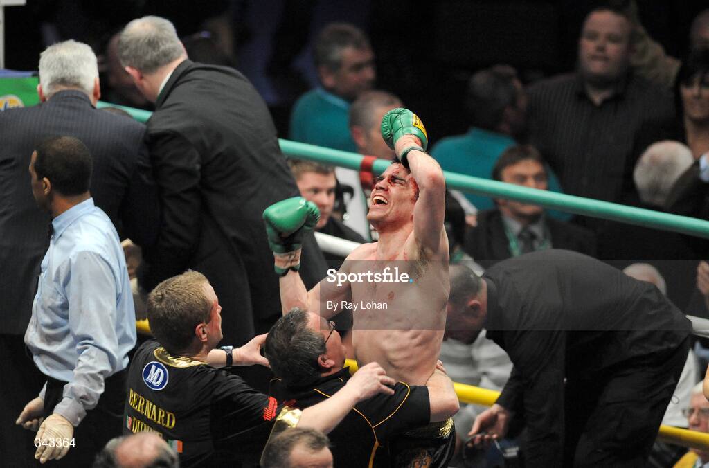 21 March 2009; Bernard Dunne is lifted by his father Brendan with promoter Brian Peters after defeatng Ricardo Cordoba during their WBA World Super Bantamweight title fight. Hunky Dory World Title Fight Night, Bernard Dunne v Ricardo Cordoba, The O2, Dublin. Picture credit: Ray Lohan / SPORTSFILE