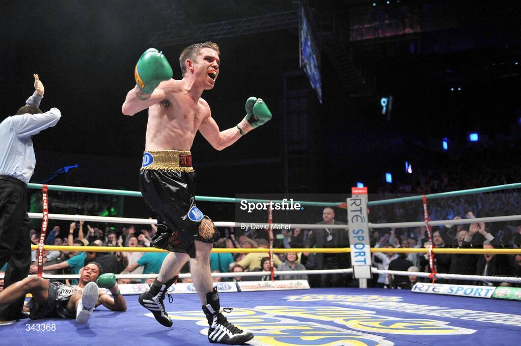 21 March 2009; Bernard Dunne knocks down Ricardo Cordoba during the eleventh round to win the WBA World Super Bantamweight title. Hunky Dory World Title Fight Night, Bernard Dunne v Ricardo Cordoba, The O2, Dublin. Picture credit: David Maher / SPORTSFILE