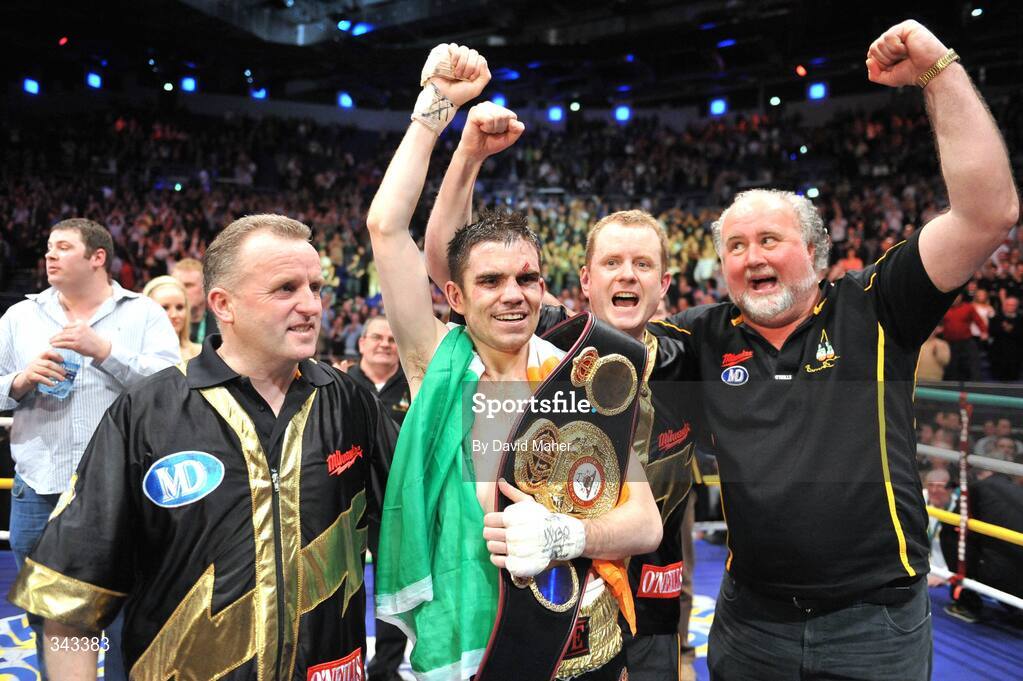 21 March 2009; Bernard Dunne celebrates with, from left, trainer Harry Hawkins, promoter Brian Peters, and sponsor Martin Donnelly, after victory over Ricardo Cordoba to win the WBA World Super Bantamweight title. Hunky Dory World Title Fight Night, Bernard Dunne v Ricardo Cordoba, The O2, Dublin. Picture credit: David Maher / SPORTSFILE
