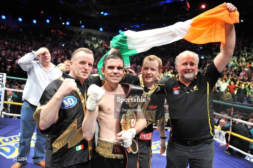 21 March 2009; Bernard Dunne celebrates with, from left, trainer Harry Hawkins, promoter Brian Peters, and sponsor Martin Donnelly after victory over Ricardo Cordoba to win the WBA World Super Bantamweight title. Hunky Dory World Title Fight Night, Bernard Dunne v Ricardo Cordoba, The O2, Dublin. Picture credit: David Maher / SPORTSFILE