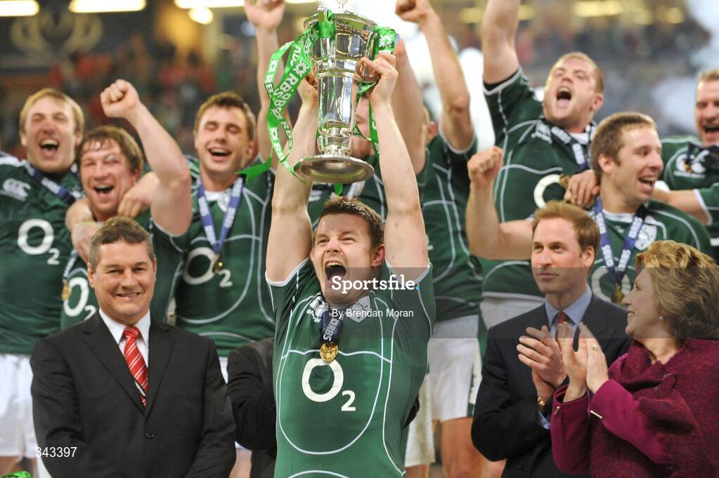 21 March 2009; Ireland captain Brian O'Driscoll lifts the RBS Six Nations trophy after the game in the company of President of Ireland Mary McAleese and HRH Prince William. RBS Six Nations Championship, Wales v Ireland, Millennium Stadium, Cardiff, Wales. Picture credit: Brendan Moran / SPORTSFILE