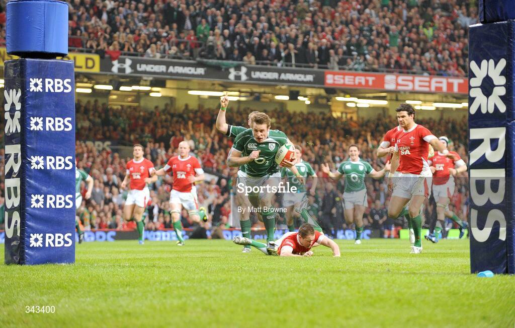 21 March 2009; Tommy Bowe, Ireland, goes over for the second try of the game despite the attention of Shane Williams, Wales. RBS Six Nations Championship, Wales v Ireland, Millennium Stadium, Cardiff, Wales. Picture credit: Matt Browne / SPORTSFILE