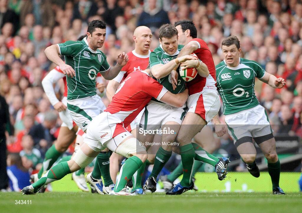 21 March 2009; Gordon D'Arcy, Ireland, in action against Dafydd Jones, left, and Stephen Jones, Wales. RBS Six Nations Championship, Wales v Ireland, Millennium Stadium, Cardiff, Wales. Picture credit: Stephen McCarthy / SPORTSFILE