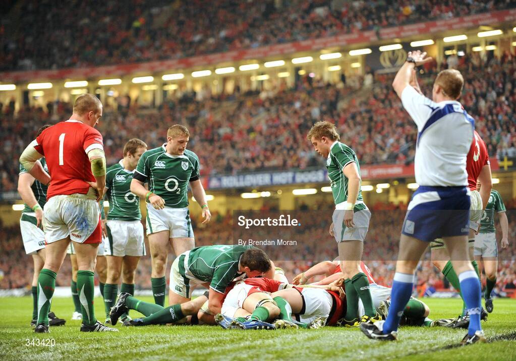 21 March 2009; Referee Wayne Barnes, right, signals to the Television Match Official to review the play which resulted in Ireland's first try of the game. RBS Six Nations Championship, Wales v Ireland, Millennium Stadium, Cardiff, Wales. Picture credit: Brendan Moran / SPORTSFILE