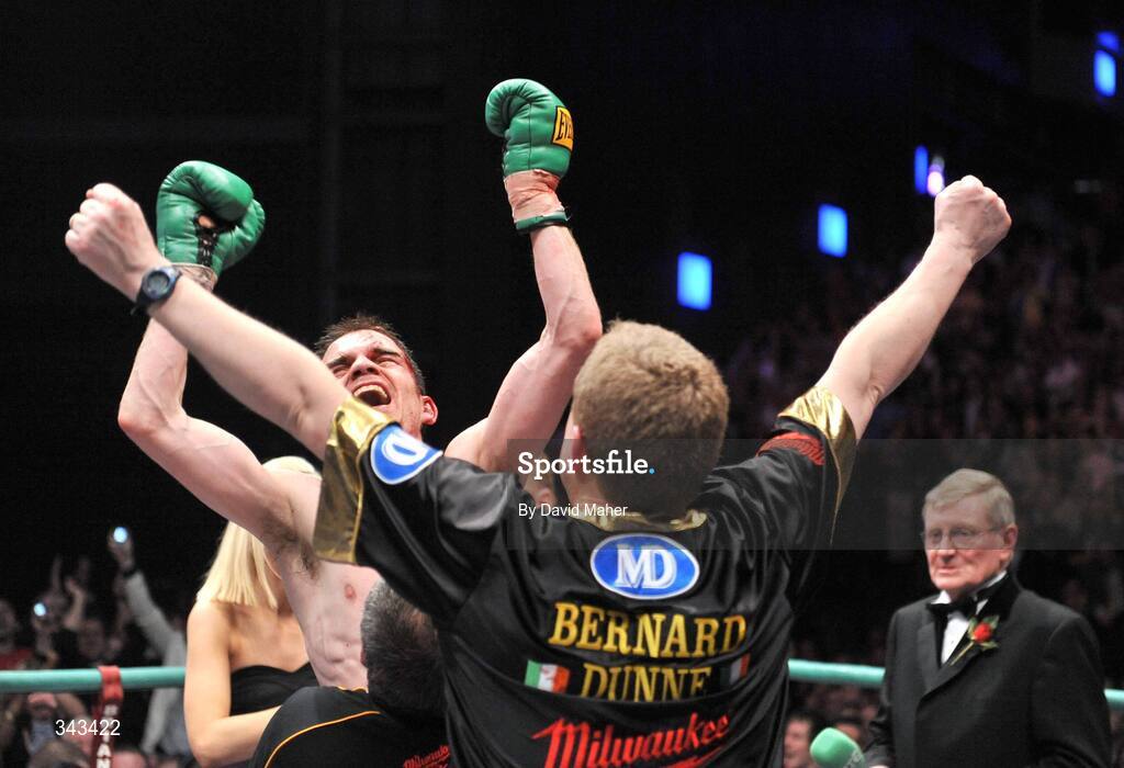 21 March 2009; Bernard Dunne celebrates with promoter Brian Peters after knocking down Ricardo Cordoba during the eleventh round to win the WBA World Super Bantamweight title. Hunky Dory World Title Fight Night, Bernard Dunne v Ricardo Cordoba, The O2, Dublin. Picture credit: David Maher / SPORTSFILE