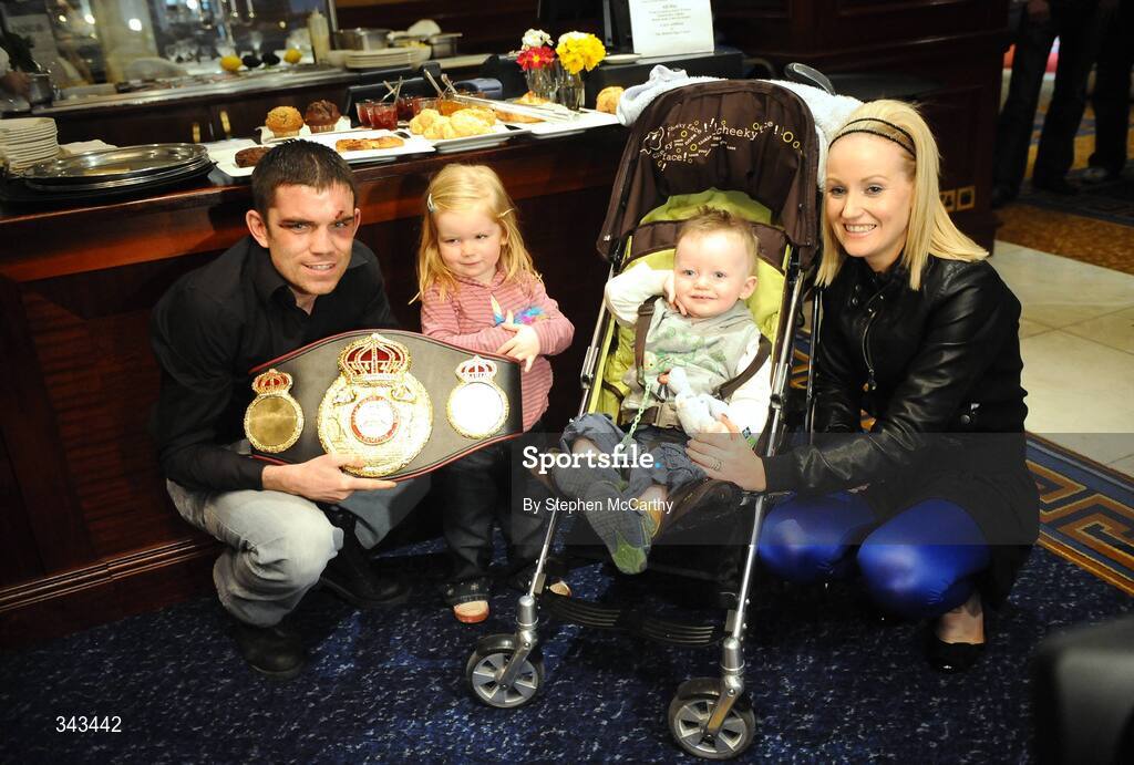 22 March 2009; Newly crowned WBA World Super Bantamweight Champion Bernard Dunne with his family, from left, daughter Caoimhe, age 2, and Finn, age 1, and wife Pamela before a press conference following his victory over Ricardo Cordoba at the Hunky Dorys World Title Fight Night. Bernard Dunne Press Conference, Ballsbridge Court, Dublin. Picture credit: Stephen McCarthy / SPORTSFILE