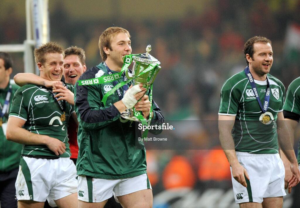 21 March 2009; Ireland's Stephen Ferris celebrates with the Six Nations Championship trophy alongside team-mates Luke Fitzgerald, Ronan O'Gara and Geordan Murphy. RBS Six Nations Championship, Wales v Ireland, Millennium Stadium, Cardiff, Wales. Picture credit: Matt Browne / SPORTSFILE