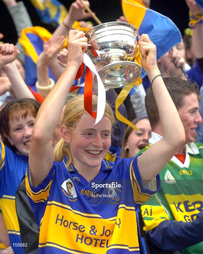 19 September 2004; Tipperary captain Joanne Ryan lifts the O'Duffy cup. Foras na Gaeilge Senior Camogie Championship All-Ireland Final, Tipperary v Cork, Croke Park, Dublin. Picture credit; Pat Murphy / SPORTSFILE