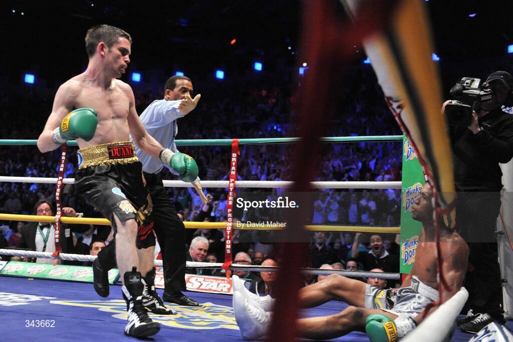 21 March 2009; Bernard Dunne  puts Ricardo Cordoba down during the third round during their WBA World Super Bantamweight title fight. Hunky Dory World Title Fight Night, Bernard Dunne v Ricardo Cordoba, The O2, Dublin. Picture credit: David Maher / SPORTSFILE