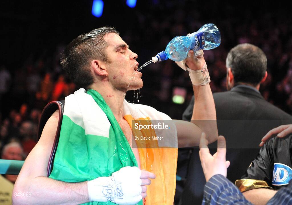 21 March 2009; Bernard Dunne takes a drink after victory over Ricardo Cordoba at the end of their WBA World Super Bantamweight title fight. Hunky Dory World Title Fight Night, Bernard Dunne v Ricardo Cordoba, The O2, Dublin. Picture credit: David Maher / SPORTSFILE