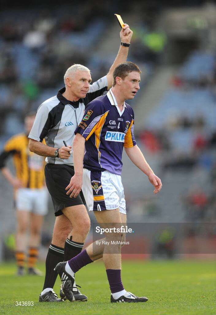 17 March 2009; Kevin Nolan, Kilmacud Crokes, is shown a yellow card by referee Gearoid O Conamha. AIB All-Ireland Senior Club Football Championship Final, Crossmaglen Rangers, Co. Armagh, v Kilmacud Crokes, Dublin. Croke Park, Dublin. Picture credit: Ray McManus / SPORTSFILE