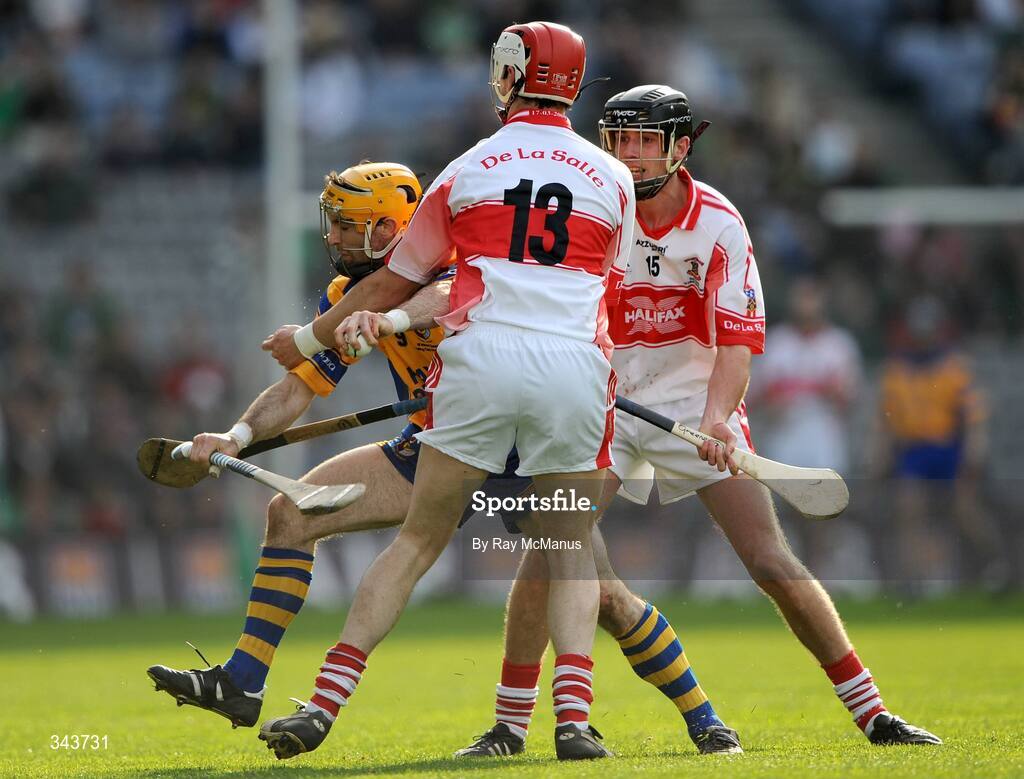 17 March 2009; Leo Smith, Portumna, in action against De La Salle players Dean Twomey, 13, and David Green. AIB All-Ireland Senior Club Hurling Championship Final, Portumna, Co. Galway, v De La Salle, Waterford, Croke Park, Dublin. Picture credit: Ray McManus / SPORTSFILE