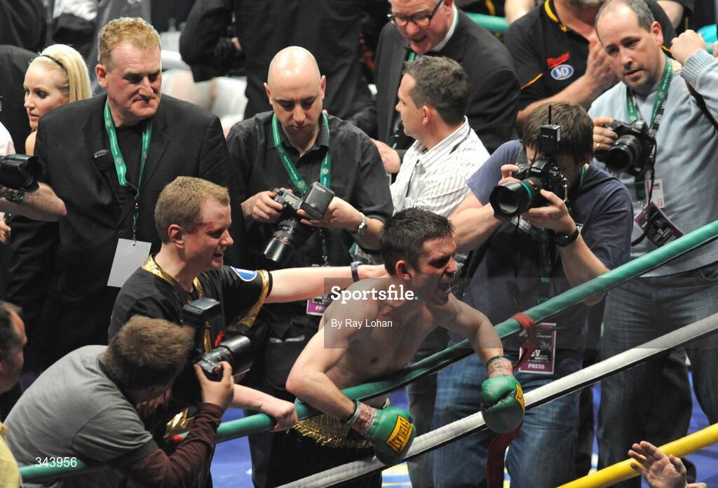 21 March 2009; Bernard Dunne celebrates with promoter Brian Peters after defeating Ricardo Cordoba in their WBA World Super Bantamweight title fight. Hunky Dory World Title Fight Night, Bernard Dunne v Ricardo Cordoba, The O2, Dublin. Picture credit: Ray Lohan / SPORTSFILE