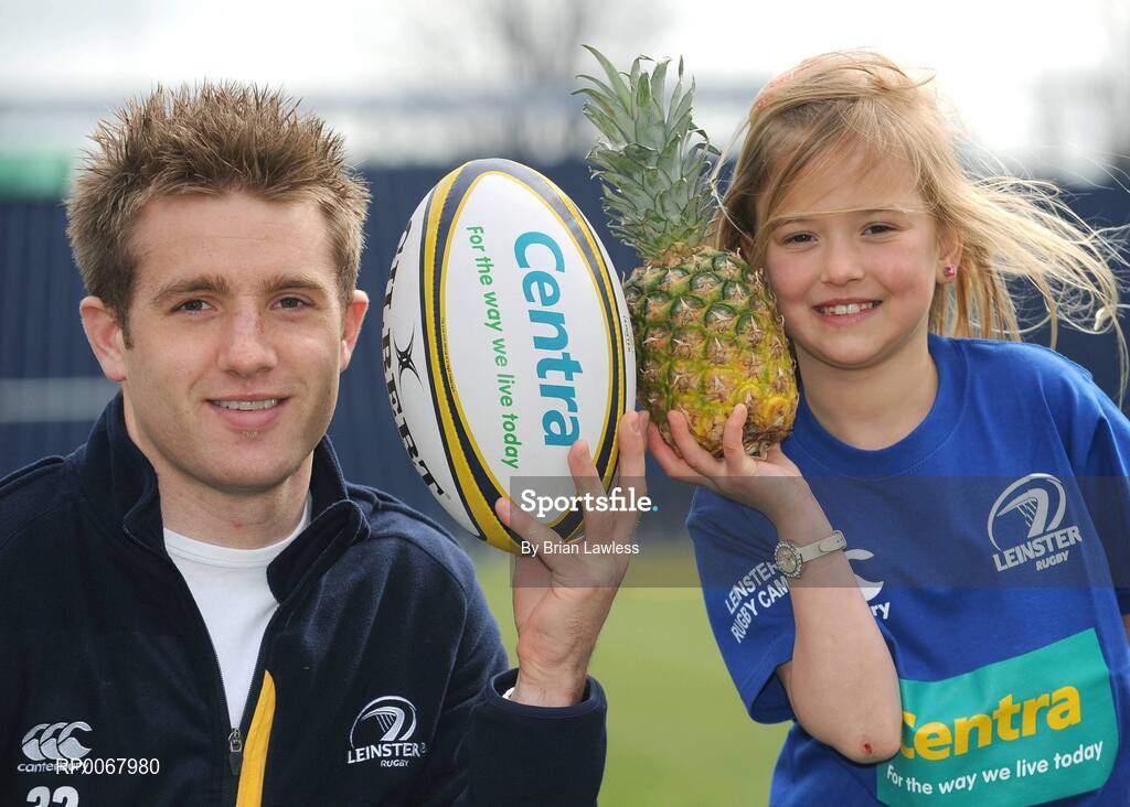 25 March 2009; As Rugby fever grips the nation in the aftermath of Ireland's historic RBS Six Nations Grand Slam, one of its heroes, Luke Fitzgerald took time from his well-earned break to launch the Centra Rugby Summer Camps which take place this summer. Grand Slam winner Luke lined out to give a sneak preview of some tips that can be learned at the camps this summer, including how to eat well and ensure they fuel their bodies with the right foods. Camps will take place in a range of venues throughout Leinster, Munster and Connacht in June, July and August, giving budding rugby stars a week long, action-packed and fun rugby experience. At the launch is Ireland's Luke Fitzgerald with young rugby fan Victoria Nolan, age 9. RDS, Dublin. Picture credit: Brian Lawless / SPORTSFILE