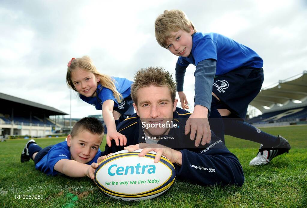 25 March 2009; As Rugby fever grips the nation in the aftermath of Ireland's historic RBS Six Nations Grand Slam, one of its heroes, Luke Fitzgerald took time from his well-earned break to launch the Centra Rugby Summer Camps which take place this summer. Grand Slam winner Luke lined out to give a sneak preview of some tips that can be learned at the camps this summer, including how to eat well and ensure they fuel their bodies with the right foods. Camps will take place in a range of venues throughout Leinster, Munster and Connacht in June, July and August, giving budding rugby stars a week long, action-packed and fun rugby experience. At the launch is Ireland's Luke Fitzgerald with young rugby fans, from left, Sam Kelly, age 7, Victoria Nolan, age 9, and Sean Og Barnes, age 9. RDS, Dublin. Picture credit: Brian Lawless / SPORTSFILE