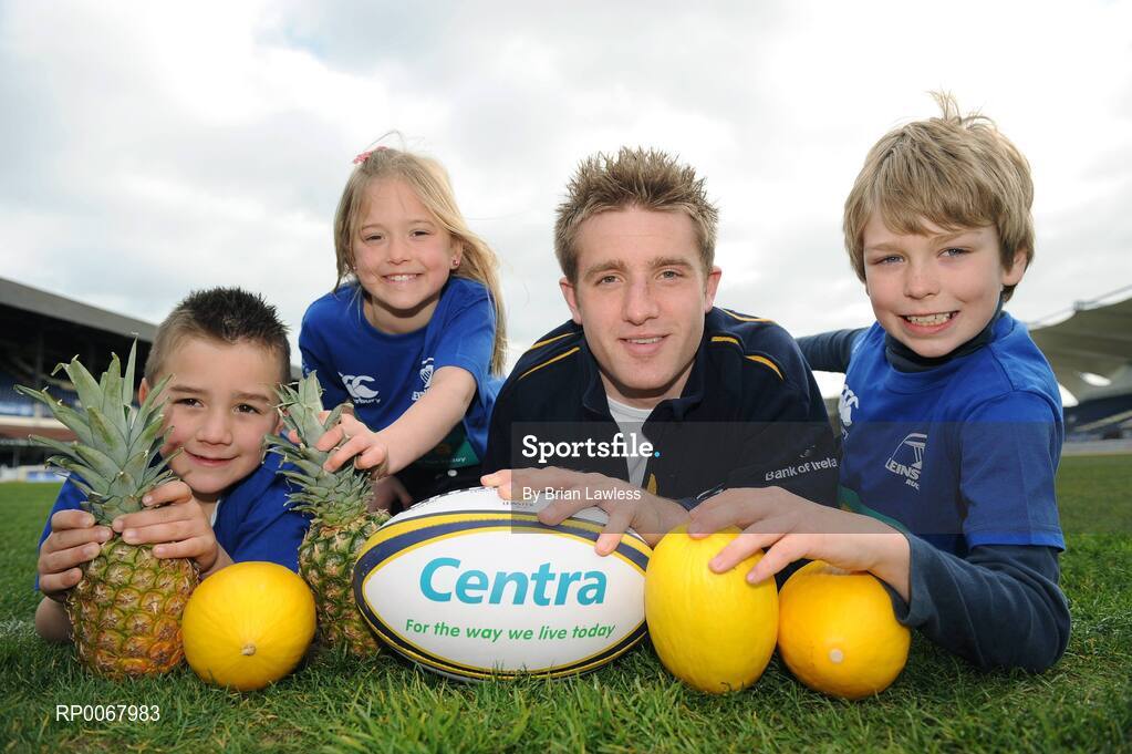 25 March 2009; As Rugby fever grips the nation in the aftermath of Ireland's historic RBS Six Nations Grand Slam, one of its heroes, Luke Fitzgerald took time from his well-earned break to launch the Centra Rugby Summer Camps which take place this summer. Grand Slam winner Luke lined out to give a sneak preview of some tips that can be learned at the camps this summer, including how to eat well and ensure they fuel their bodies with the right foods. Camps will take place in a range of venues throughout Leinster, Munster and Connacht in June, July and August, giving budding rugby stars a week long, action-packed and fun rugby experience. At the launch is Ireland's Luke Fitzgerald with young rugby fans, from left, Sam Kelly, age 7, Victoria Nolan, age 9, and Sean Og Barnes, age 9. RDS, Dublin. Picture credit: Brian Lawless / SPORTSFILE