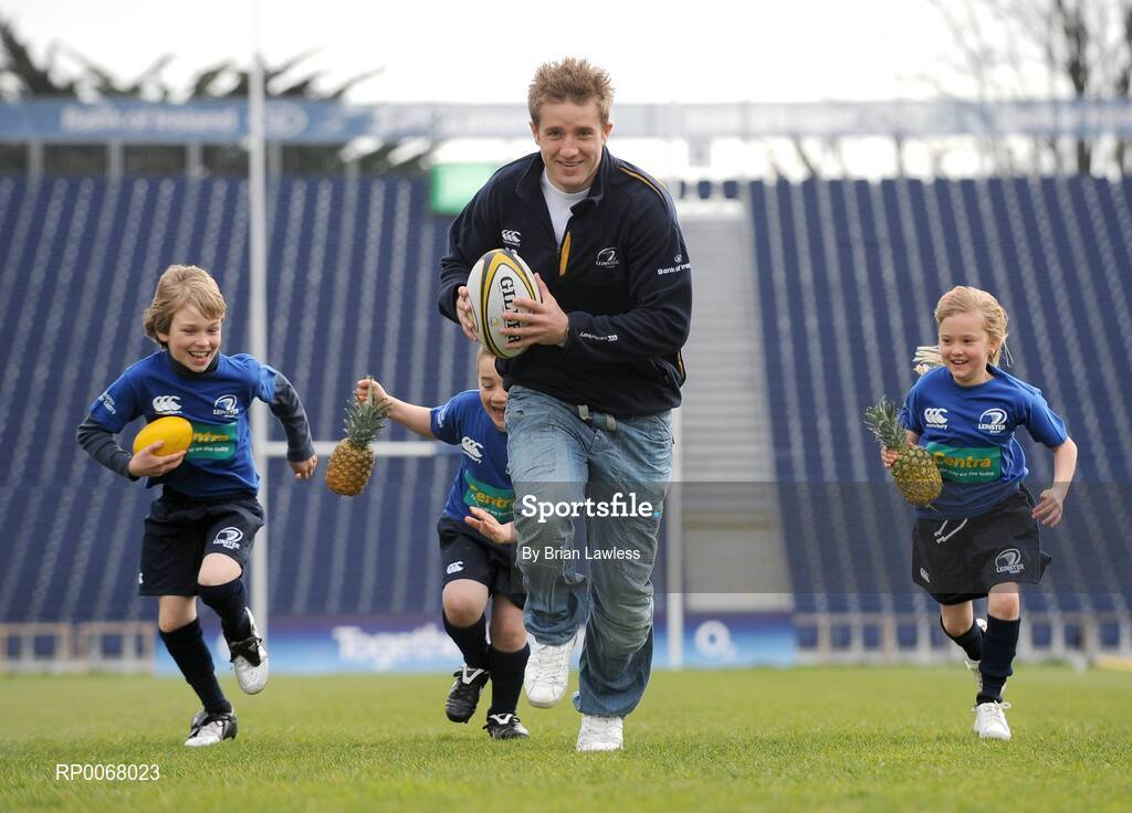 25 March 2009; As Rugby fever grips the nation in the aftermath of Ireland's historic RBS Six Nations Grand Slam, one of its heroes, Luke Fitzgerald took time from his well-earned break to launch the Centra Rugby Summer Camps which take place this summer. Grand Slam winner Luke lined out to give a sneak preview of some tips that can be learned at the camps this summer, including how to eat well and ensure they fuel their bodies with the right foods. Camps will take place in a range of venues throughout Leinster, Munster and Connacht in June, July and August, giving budding rugby stars a week long, action-packed and fun rugby experience. At the launch is Ireland's Luke Fitzgerald with young rugby fans, from left, Sean Og Barnes, age 9, Sam Kelly, age 7, and Victoria Nolan, age 9. RDS, Dublin. Picture credit: Brian Lawless / SPORTSFILE