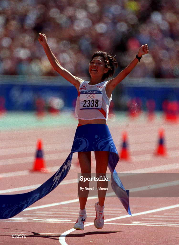 25 September 2000; Naoko Takahasi of Japan crosses the line to win the gold in the womens marathon during the Sydney Olympics at Sydney Olympic Park in Sydney, Australia. Photo by Brendan Moran/Sportsfile