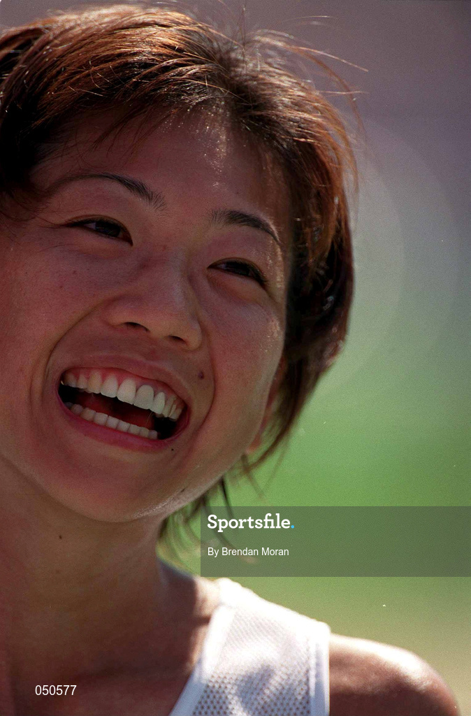 25 September 2000; Naoko Takahasi of Japan shows her delight after winning the gold medal in the womens marathon during the Sydney Olympics at Sydney Olympic Park in Sydney, Australia. Photo by Brendan Moran/Sportsfile
