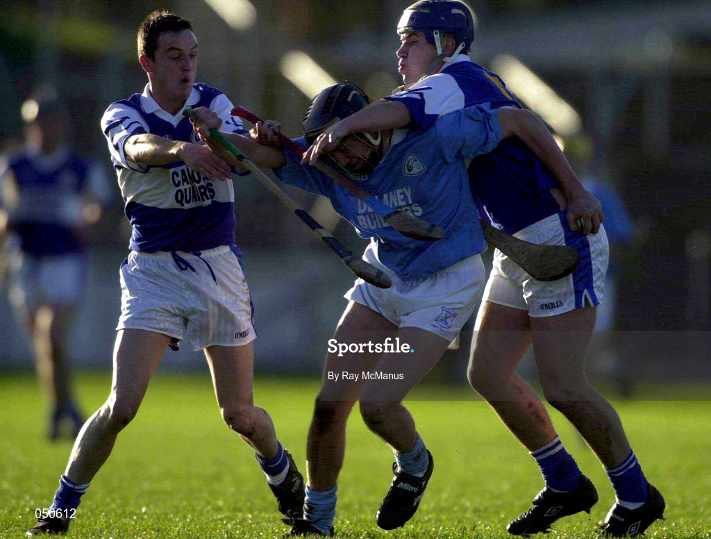 26 November 2000; Eddie Brennan of Graigue Ballycallan is tackled by John Hanlon, left and Robert Delaney of Castletown during the AIB Leinster Senior Hurling Championship Final between Graigue Ballycallan and University College Dublin at Nowlan Park in Kilkenny. Photo by Ray McManus/Sportsfile