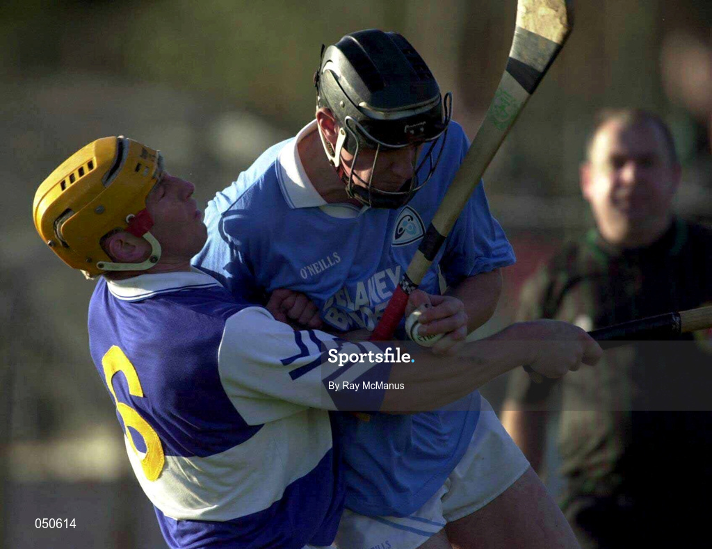 26 November 2000; John Hoyne of Graigue Ballycallan is tackled by Cyril Cuddy of Castletown during the AIB Leinster Senior Hurling Championship Final between Graigue Ballycallan and University College Dublin at Nowlan Park in Kilkenny. Photo by Ray McManus/Sportsfile