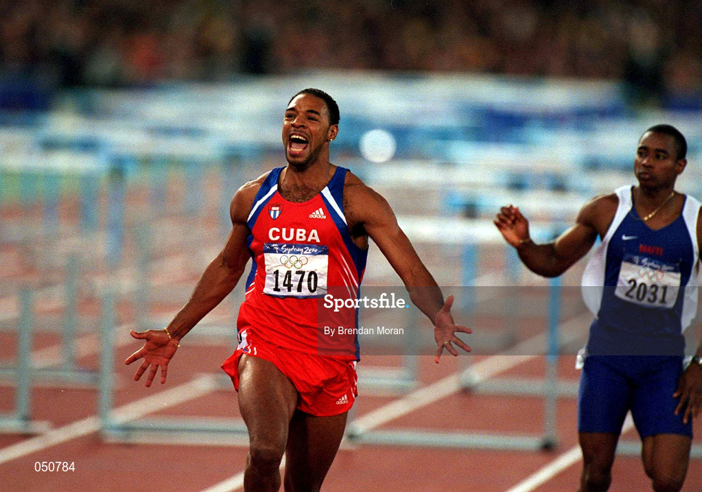 23 September 2000; Cuba's Anier Garcia celebrates after winning gold in the mens 110m hurdles during the Sydney Olympics at Sydney Olympic Park in Sydney, Australia. Photo by Brendan Moran/Sportsfile