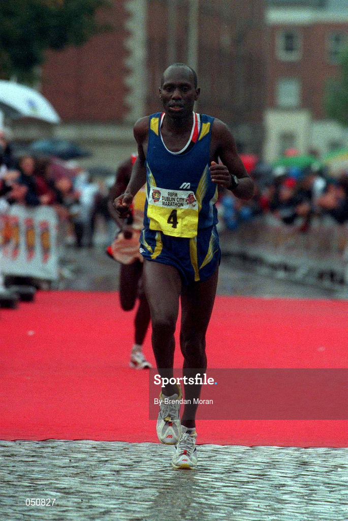 30 October 2000; John Mutai crosses the line during the 98FM Dublin City Marathon in Dublin. Photo by Brendan Moran/Sportsfile