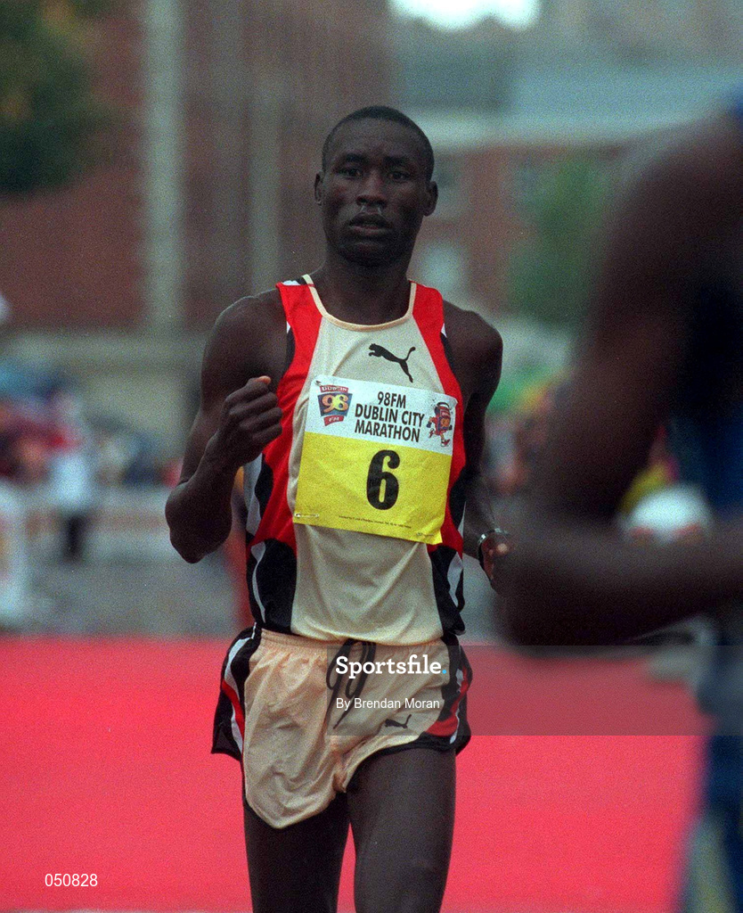 30 October 2000; Penuel Osoro crosses the line during the 98FM Dublin City Marathon in Dublin. Photo by Brendan Moran/Sportsfile
