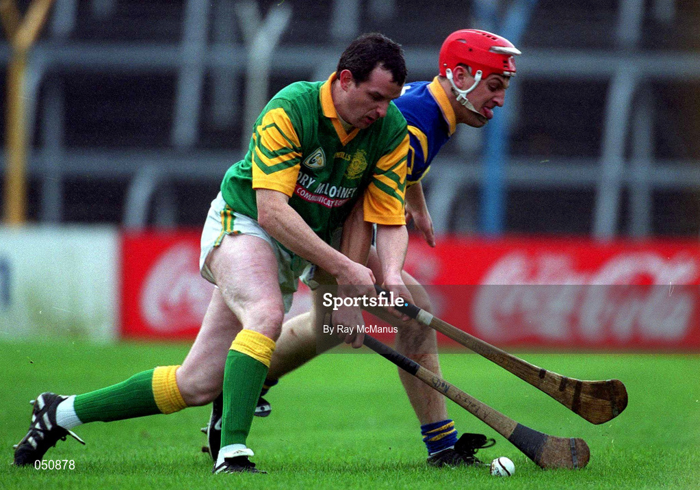 30 October 2000; Anthony Foley of Patrickswell in action against Michael O'Meara of Toomevara during the AIB Munster Club Hurling Championship match between Patrickswell and Toomevara at Semple Stadium in Thurles, Tipperary. Photo by Ray McManus/Sportsfile
