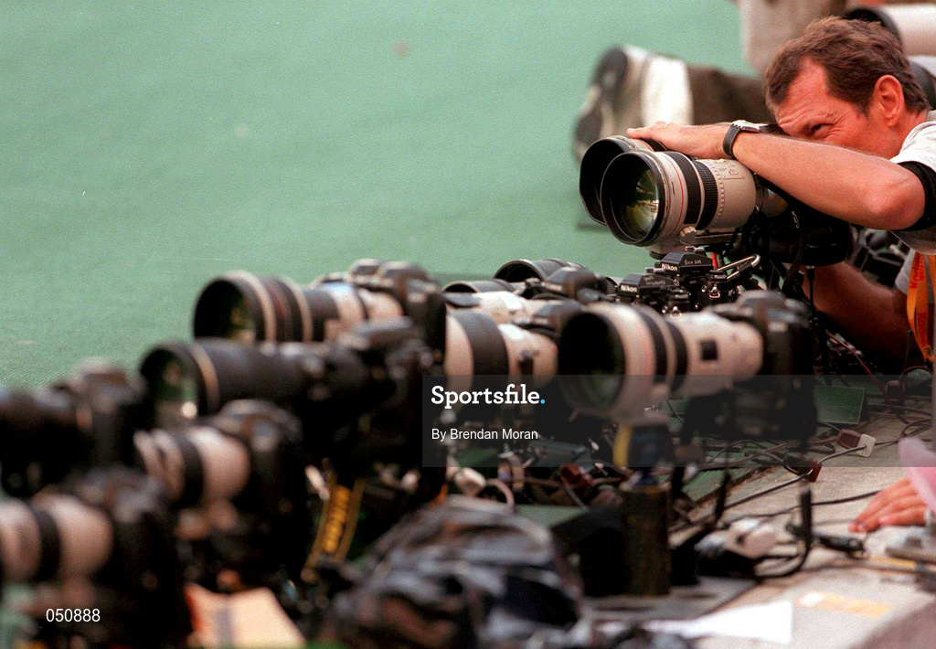 23 September 2000; Photographers set up remote cameras for the final of the Men's 100m. Stadium Australia, Sydney Olympic Park, Homebush Bay, Sydney, Australia. Photo by Brendan Moran/Sportsfile