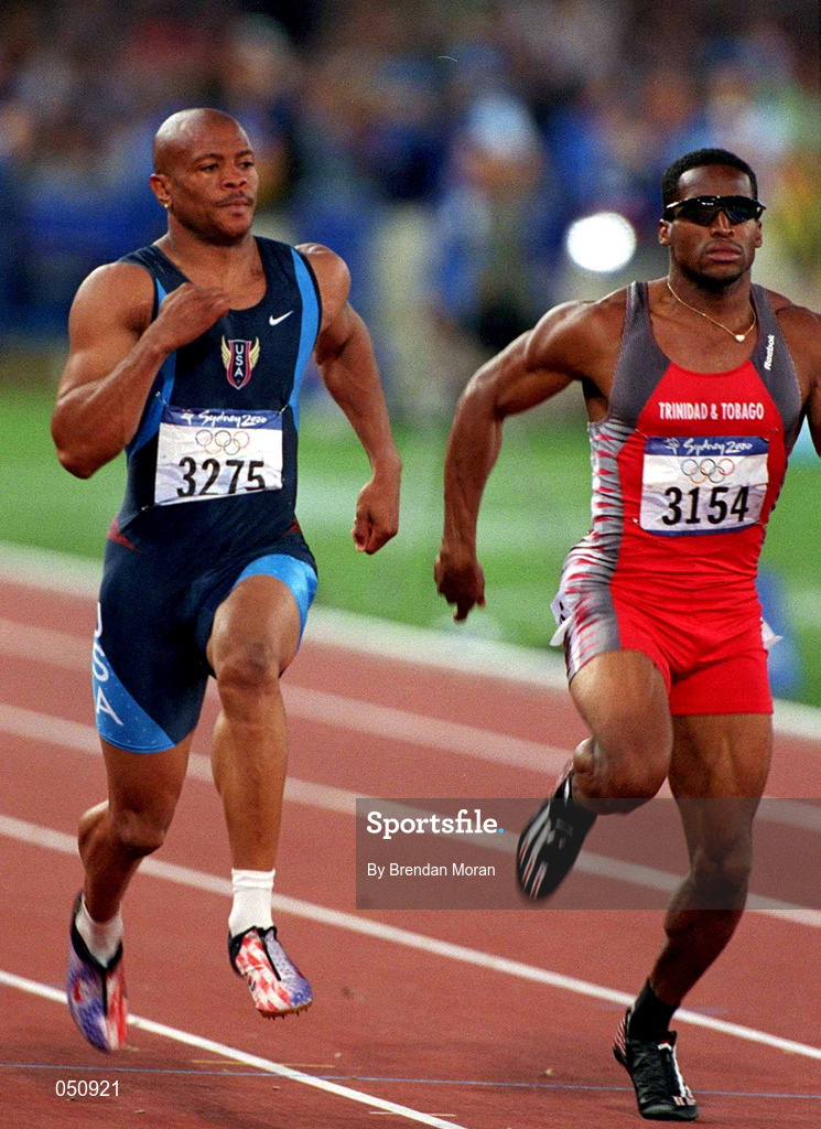 23 September 2000; USA's Maurice Greene, left, beats Ato Boldon in the mens 100m semi final, Stadium Australia, Sydney Olympic Park, Homebush Bay, Sydney, Australia. Photo by Brendan Moran/Sportsfile