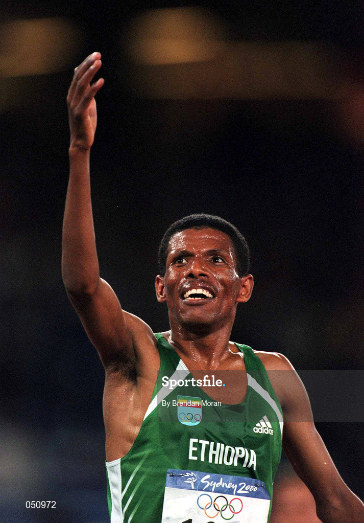 23 September 2000; Ethiopia's Haile Gebrselassie celebrates after winning gold in the mens 10,000 Final during the Sydney Olympics at Sydney Olympic Park in Sydney, Australia. Photo by Brendan Moran/Sportsfile