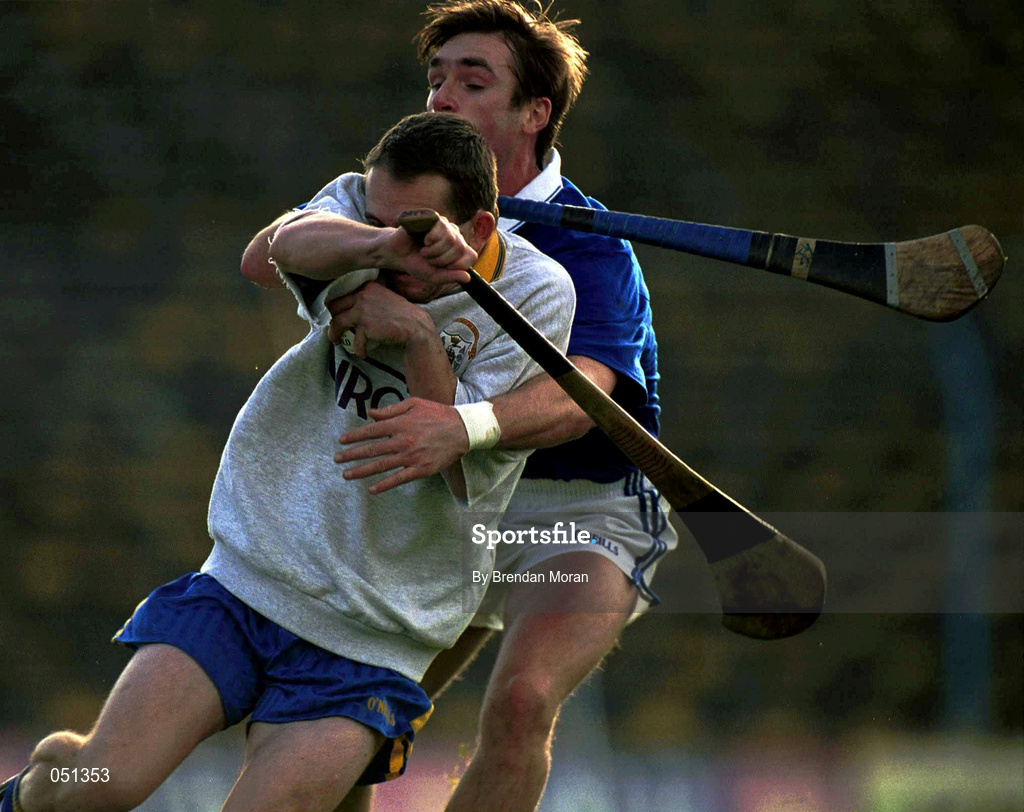 26 November 2000; Sixmilebridge goalkeeper David Fitzgerald is tackled by Tony Browne of Mount Sion during the AIB Munster Club Hurling Championship Final match between Sixmilebridge and Mount Sion at Semple Stadium in Thurles, Tipperary. Photo by Brendan Moran/Sportsfile