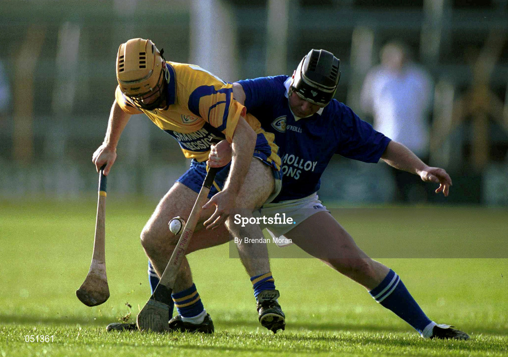 26 November 2000; Robert Conlon of Sixmilebridge, left, in action against Paraic Fanning of Mount Sion during the AIB Munster Club Hurling Championship Final match between Sixmilebridge and Mount Sion at Semple Stadium in Thurles, Tipperary. Photo by Brendan Moran/Sportsfile