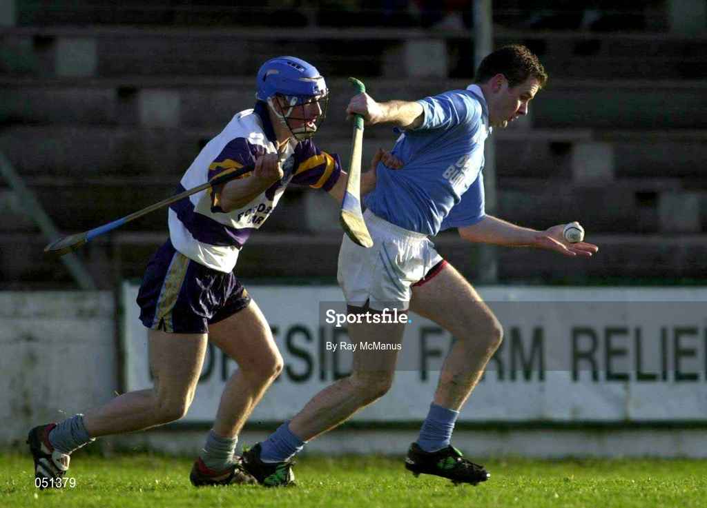 26 November 2000; Tomas Dermody of Graigue Ballycallan is tackled by Colm Hegarty of UCD during the AIB Leinster Senior Hurling Championship Final between Graigue Ballycallan and University College Dublin at Nowlan Park in Kilkenny. Photo by Ray McManus/Sportsfile