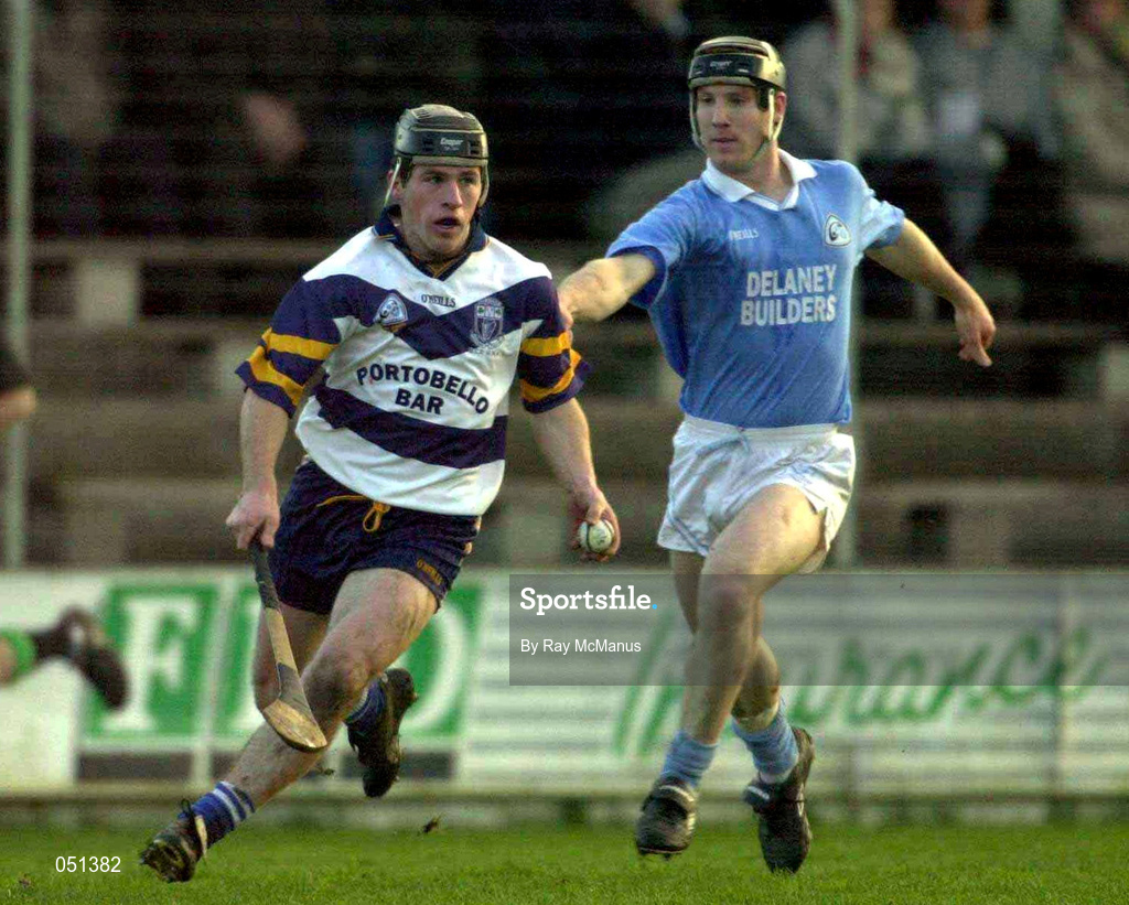 26 November 2000; Pat Fitzgerald of UCD races clear of Denis Byrne of Graigue Ballycallan during the AIB Leinster Senior Hurling Championship Final between Graigue Ballycallan and University College Dublin at Nowlan Park in Kilkenny. Photo by Ray McManus/Sportsfile