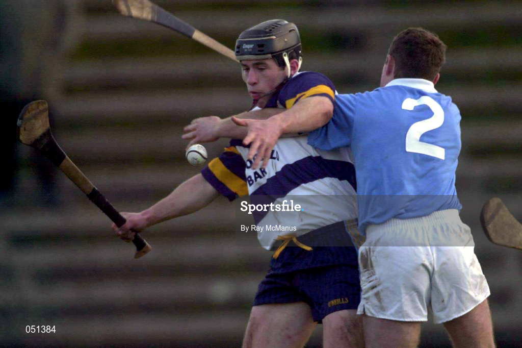 26 November 2000; Pat Fitzgerald of UCD is tackled by Graigue Ballycallan corner back Johnny Butler during the AIB Leinster Senior Hurling Championship Final between Graigue Ballycallan and University College Dublin at Nowlan Park in Kilkenny. Photo by Ray McManus/Sportsfile