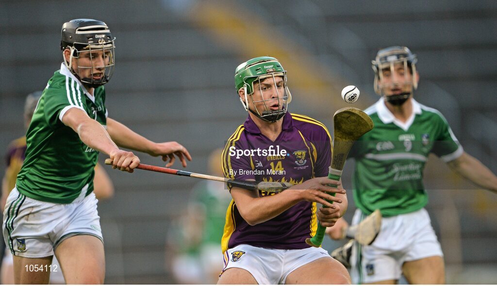 12 September 2015; Conor McDonald, Wexford, controls the sliotar ahead of Gearóid Hegarty, Limerick. Bord Gais Energy GAA Hurling All-Ireland U21 Championship Final, Limerick v Wexford, Semple Stadium, Thurles, Co. Tipperary. Picture credit: Brendan Moran / SPORTSFILE