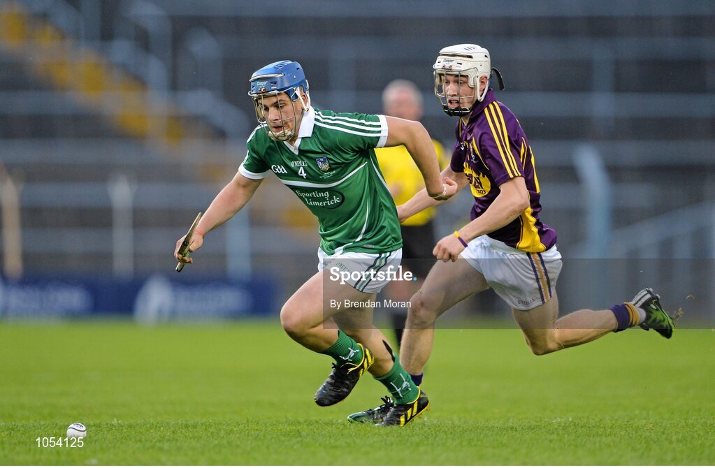 12 September 2015; Michael Casey, Limerick, in action against Cathal Dunbar, Wexford. Bord Gais Energy GAA Hurling All-Ireland U21 Championship Final, Limerick v Wexford, Semple Stadium, Thurles, Co. Tipperary. Picture credit: Brendan Moran / SPORTSFILE