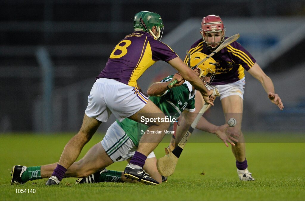 12 September 2015; Tom Morrissey, Limerick, in action against Conor Devitt, left, and Pádraig Foley, Wexford. Bord Gais Energy GAA Hurling All-Ireland U21 Championship Final, Limerick v Wexford, Semple Stadium, Thurles, Co. Tipperary. Picture credit: Brendan Moran / SPORTSFILE