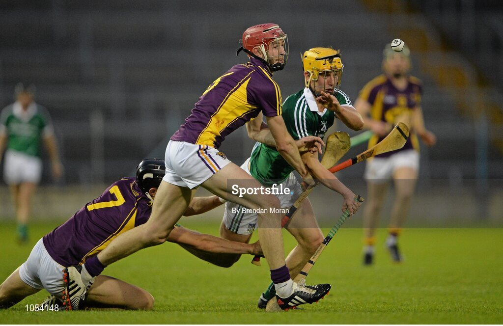 12 September 2015; Tom Morrissey, Limerick, in action against Jack O'Connor, left, and Pádraig Foley, Wexford. Bord Gais Energy GAA Hurling All-Ireland U21 Championship Final, Limerick v Wexford, Semple Stadium, Thurles, Co. Tipperary. Picture credit: Brendan Moran / SPORTSFILE