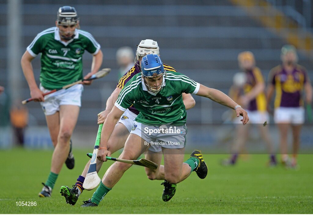 12 September 2015; Michael Casey, Limerick, in action against Cathal Dunbar, Wexford. Bord Gais Energy GAA Hurling All-Ireland U21 Championship Final, Limerick v Wexford, Semple Stadium, Thurles, Co. Tipperary. Picture credit: Brendan Moran / SPORTSFILE